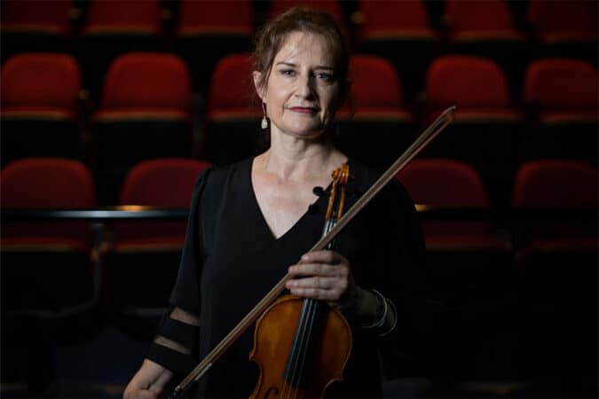 Image: Concertmaster of the Canberra Symphony Orchestra, Kirsten Williams at Tuggeranong Arts Centre. Photo: Martin Ollman, 2023